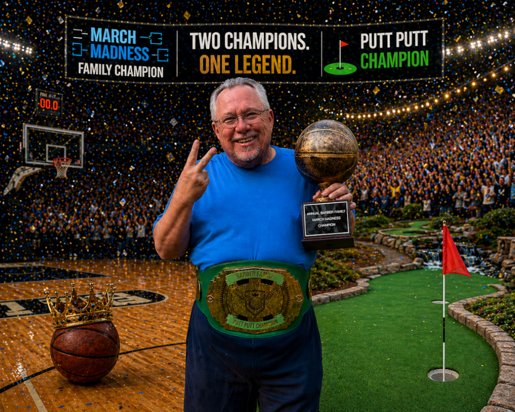 Howie Barber standing between a basketball court and mini golf course holding the Barber Family March Madness trophy while wearing the Barber Family Putt Putt Championship belt as confetti falls around him during the family’s first “Double Champ” celebration.